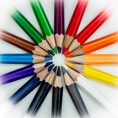 Fototapeta premium colored pencils circle on white background