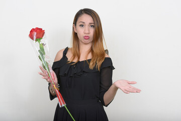 Portrait of young beautiful Asian woman ready for Valentine's day