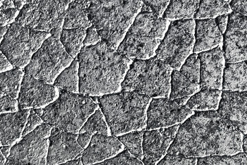 Grunge road texture. Distressed asphalt background. Gray dry cracked street. Grain and noise pattern.