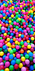 Fototapeta na wymiar Color balls. bright colors background, plastic balls in the kids playground