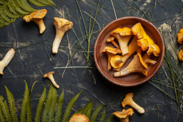 Yellow mushrooms top view, chanterelles on the table,