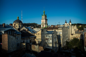 panoramic view on historical center with high tower and catholic cathedral in Lviv city