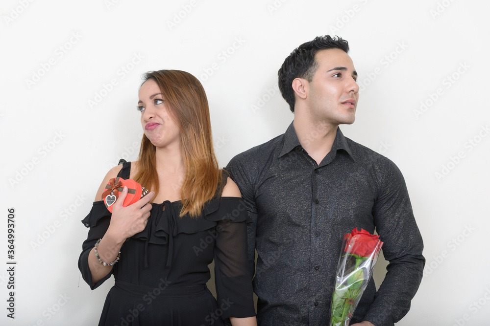 Wall mural Portrait of young multi ethnic couple together and in love