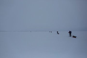Ski expedition in Inari Lake, Lapland, Finland