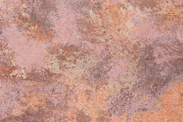 Metal surface with brown and orange paint flaking and cracking texture. Rusty Multicolored background. 