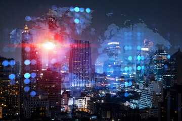 Hologram of Earth planet map on night panoramic cityscape of Bangkok, Asia. The concept of international companies. Multi Exposure.