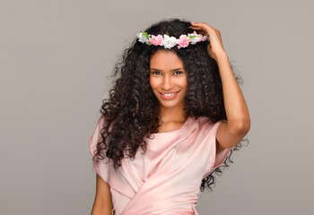 Pretty young Afro American bridesmaid in pink