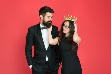 Bearded man sexy girl. Royal party. Prom couple in formal style. Prom party. Holiday celebration. Achievement. Pride and glory. Luxury success symbol. Party night. Promotion and reward. Prom queen