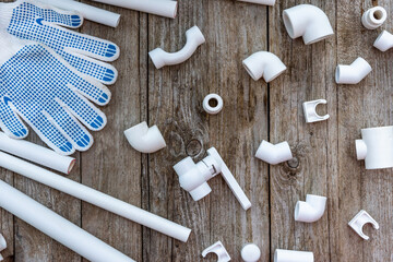 Polypropylene pipes for the water supply system at home, corners, fasteners, tees, gloves for work....