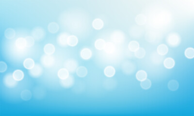 Blurred bright abstract bokeh on blue background