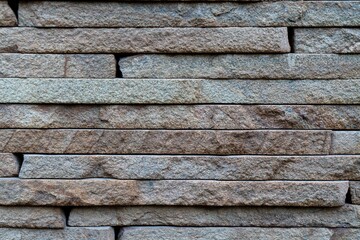 wall surface texture of hewn stone, natural stone bricks