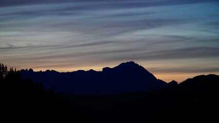 beautiful colorful sunset on the mountains with view to the alps