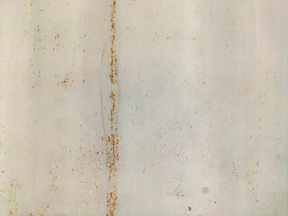 Corroded metal background. Rusty metal background with streaks of rust. Rust stains. Rystycorrosion.