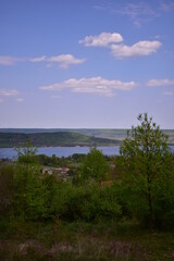 Beautiful summer landscape with hills and high forests