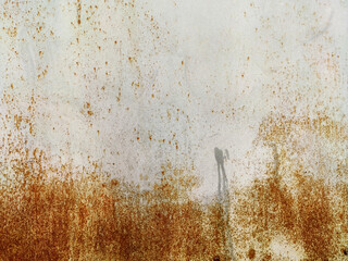Corroded metal background. Rusty metal background with streaks of rust. Rust stains. Rystycorrosion.