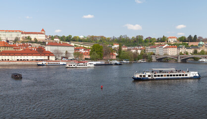 Tourist boats are on Vltava river, Prague