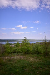 Obraz premium Beautiful summer landscape with hills and high forests