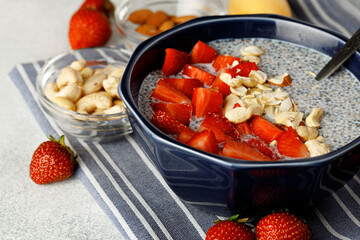 Bowl of chia pudding with fresh strawberries