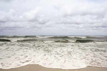 Tide at a Baltic Sea in a windy day with waves