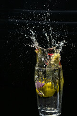 Beautiful closeup photograph of water splash with black background,