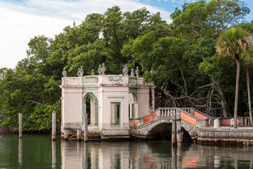 Naklejka premium Old romantic building in venitian style by the mangrove decorating garden of american mansion in Florida