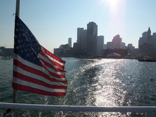 American Flag with Boston Massachusetts city skyline from the water 2008