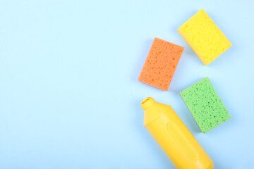 dishwashing liquid on a colored background top view. minimalism, space for text
