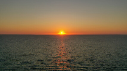 Beautiful sunrise over the horizon. aerial photography. sunrise in the ocean