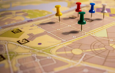 Closeup shot of colorful pins in street map