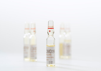 Close up view of the ampules with medicine on white back 