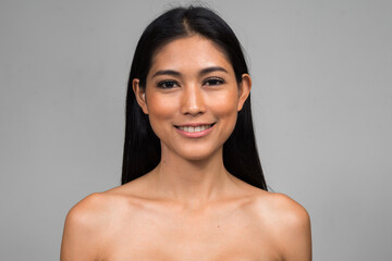 Portrait of young beautiful Asian woman shirtless