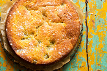 Sticky gooseberry saffron cake with vanilla custard