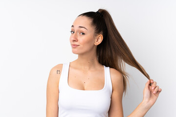 Young brunette woman over isolated white background . Portrait