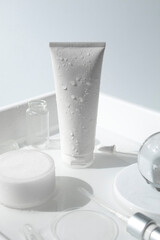 beauty treatment medical skincare and cosmetic lotion cream serum oil mockup bottle packaging product on water splash background in healthcare and medicine