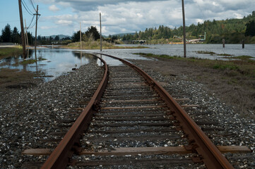 Train tracks in Coos Bay, Oregon under water. 