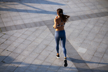 Young woman at afternoon run