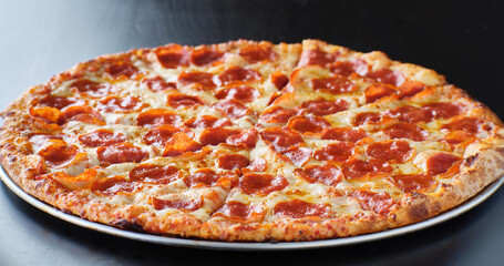 large american style pepperoni and cheese pizza