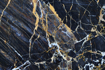 White and yellow patterned natural of dark gray marble texture for design.