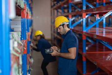 industrial worker in factory, worker man working in warehouse stock checking. suppervisor team control and management