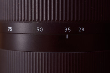 view of the focal length ring Photo lens 28-75 mm. Close-up. Very high quality photo.