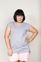Fototapeta na wymiar Portrait of young beautiful overweight Asian woman