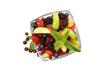 Bowl of fresh fruit salad isolated on white background