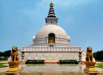 Symmetrical shot of Buddha's place of worship, Vishwa Shanti Stupa at Indraprastha Park ,New Delhi...