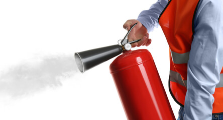 Worker using fire extinguisher on white background, closeup