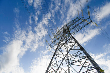 High voltage pylons with the sky in the background