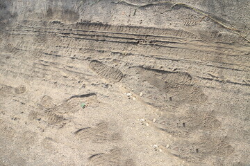 Mud, dried puddles on a sandy road