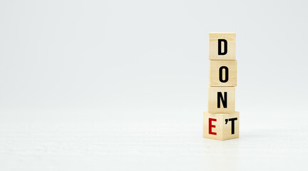 cubes with the words DON'T and DONE on white background