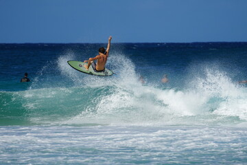 surfing waves