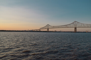 Fototapeta na wymiar Commodore Barry Bridge at Sunset Over Delaware River
