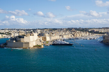 VALLETTA, MALTA - DEC 31st, 2019: The mighty Fort St Angelo dominates Grand Harbour of Valetta with ships